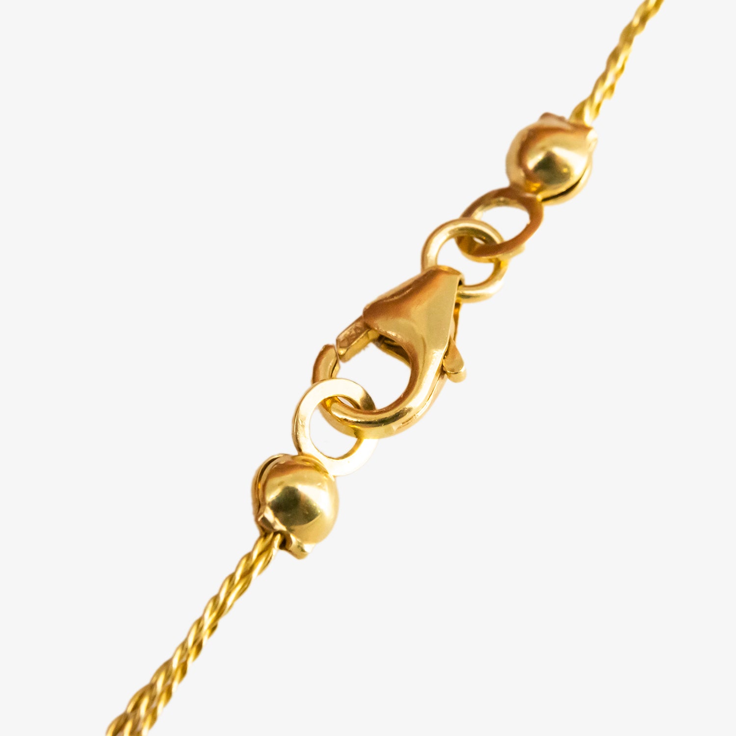 Gargantilla de oro 18 kt. con ónix y coral natural