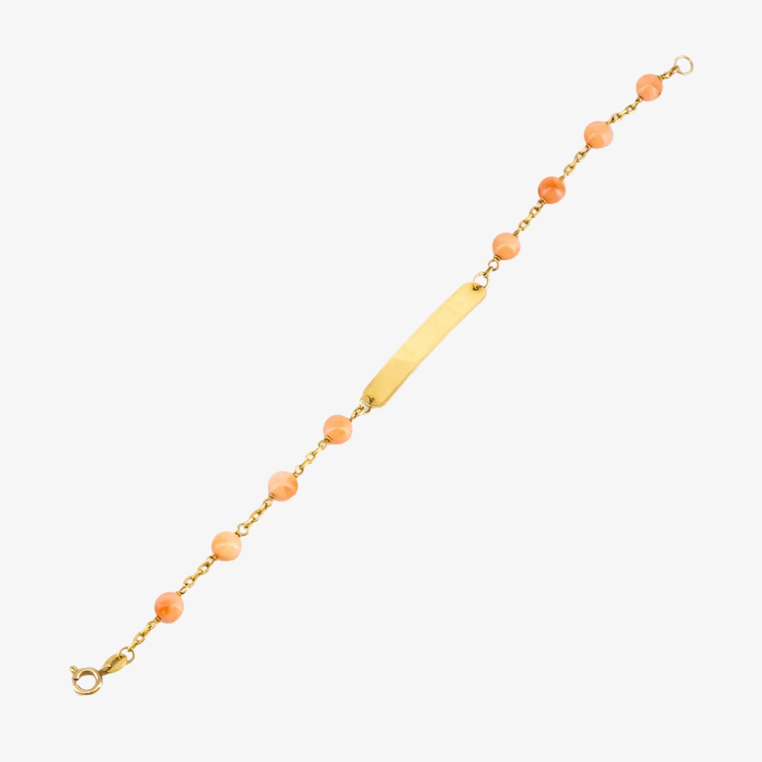 Esclava de oro de 18 kt. con corales naturales