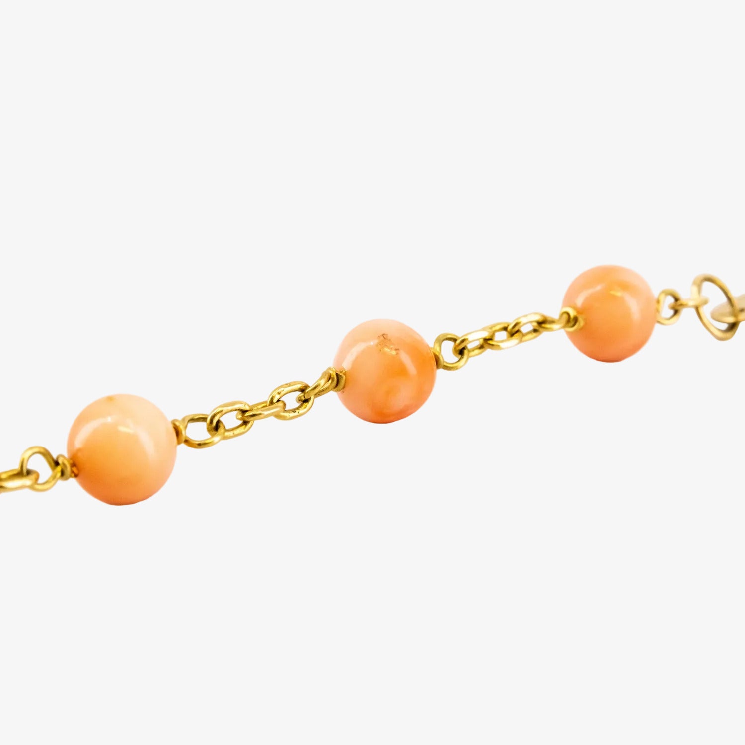 Esclava de oro de 18 kt. con corales naturales