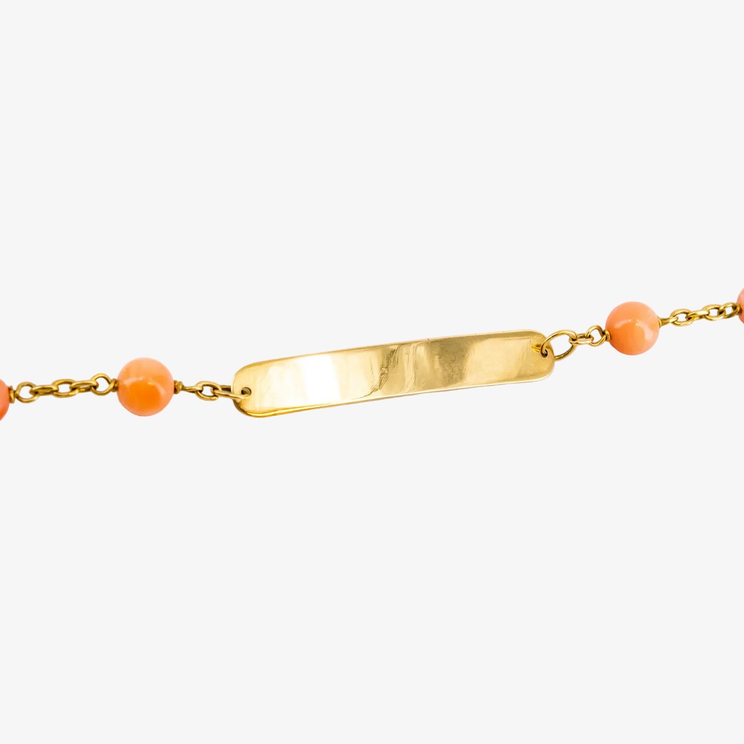 Esclava de oro de 18 kt. con corales naturales