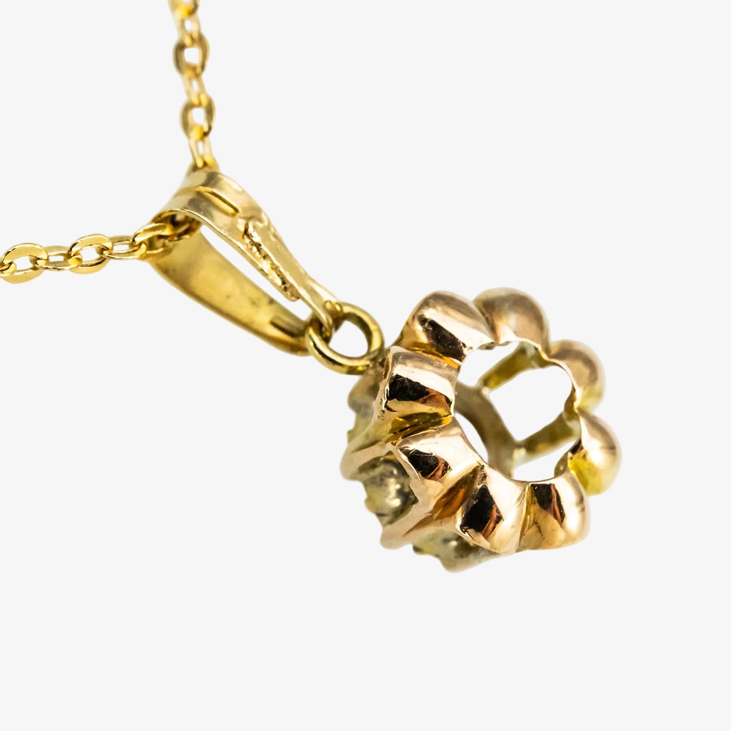 Colgante vintage de oro 18 kt. con diamante flat