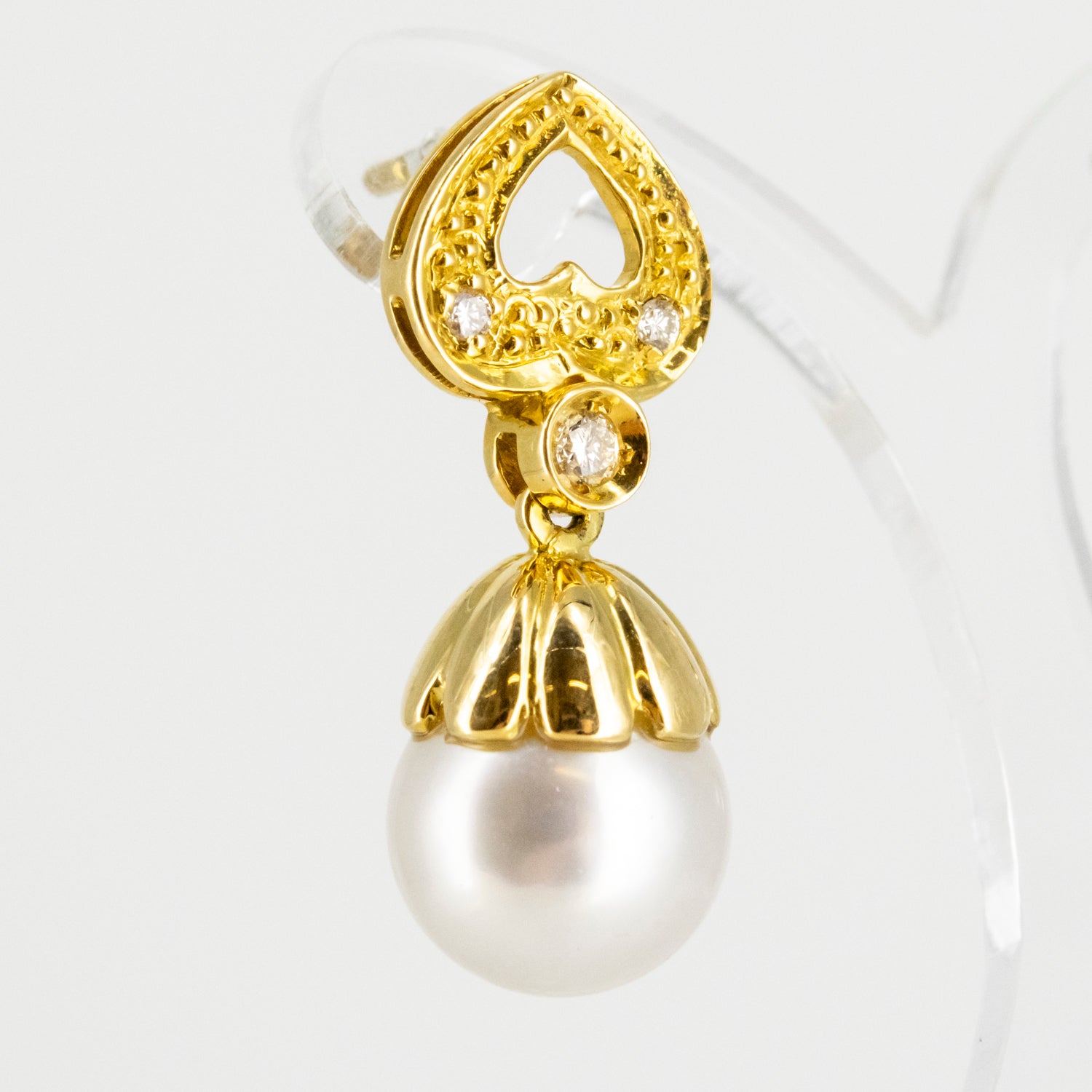 Pendientes vintage de oro de 18 kt. con diamantes y perlas australianas
